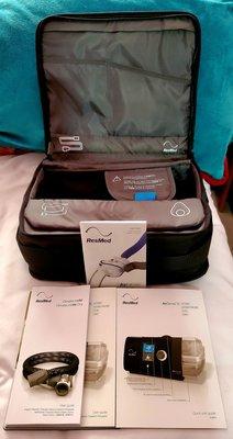 My CPAP machine's traveling case and instruction manuals and guides. Easy to use, maintain and care, very user-friendly.