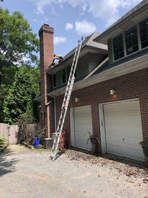 High ladder gutter cleaning.