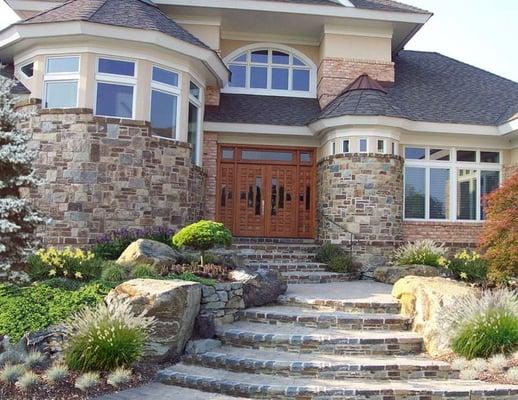 Custom Landscape Rock garden entrance with stone hardscapes, boulders, plantings in Centreville Md