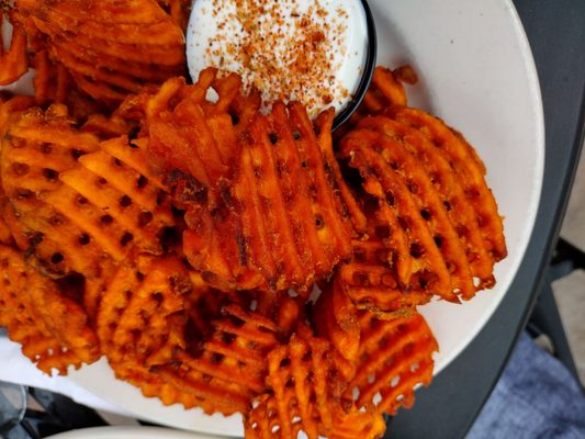 Sweet potato fries and seasoned sour cream