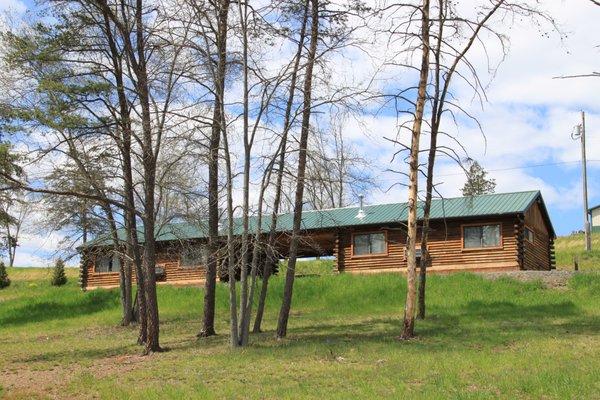 Cabin 3 & Cabin 4 have a common porch over looking the fishing pond,