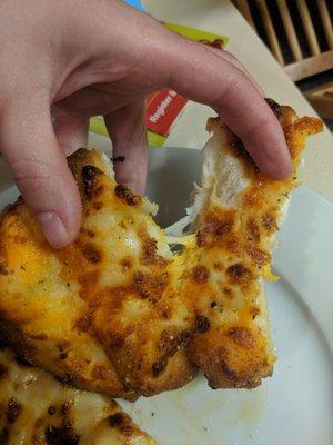 Cheese is not even melted it's just bread.