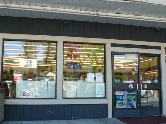 The sign in the window reads: "BUD FAMILY 18-PACK" ... family packs of beer? Crestline!