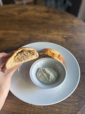 Beef and cheddar handpies. With creamy horseradish.