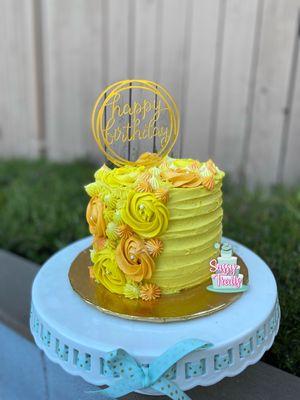 Yellow & orange birthday themed cake