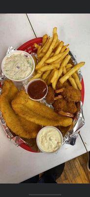 Deluxe basket- 2 farm raised catfish,6
fantail shrimp with two homemade sides.