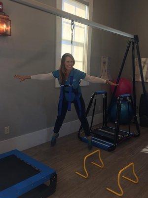 Owner, Susan Chalela, demonstrates the over head balance system!