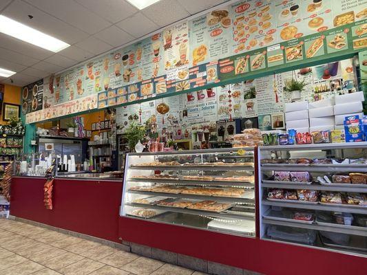 Fresh fluffy donuts, front register/checkout area.