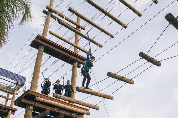 Participants on the Challenge course lower level