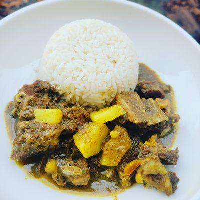 Curry goat with  Boiled Rice