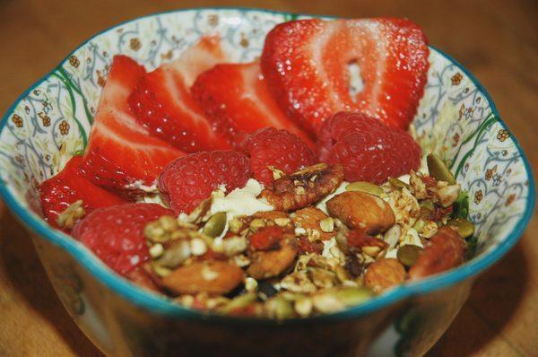 Cashew custard topped with fresh berries and Joose's grain free granola