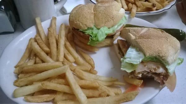 Friend chicken sandwich with fries