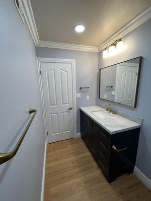 Vanity lights, new ceiling recessed lighting with a new switch installation and outlet upgrade