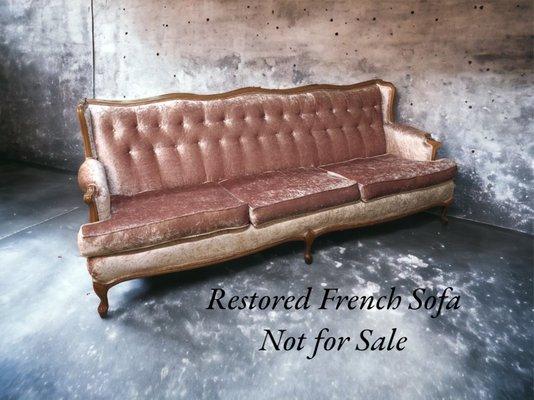 Reupholstered vintage French sofa.