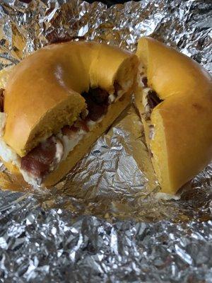 Bacon egg and cheese on egg bagel