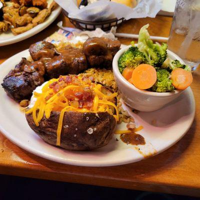 Filet medallion, vegetables and Bake potatoes,