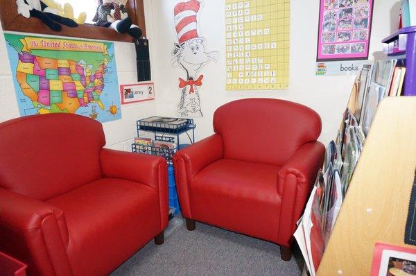 A literacy center at Good Shepherd Lutheran Preschool, featuring a large selection of picture books and audiobooks.