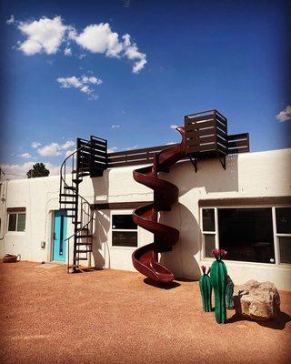 Custom roof deck, stairs, and slide!