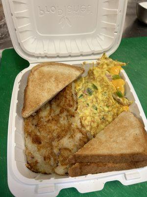 Western omelette with home fries and toast