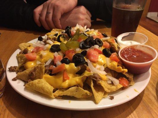 The most basic, college dorm room nachos ever (fake processed cheese and it was still over $8).  But the chips used make it all ok.