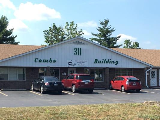 Coffee shop is on the end of this building.