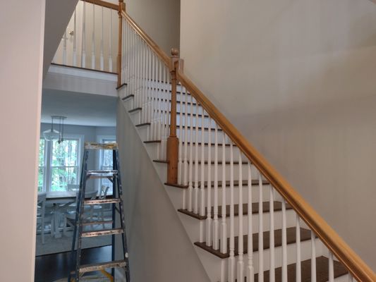 Vaulted  entry way with staircase