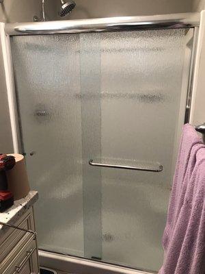 Semi frameless sliding shower door