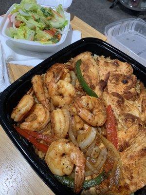 Grilled chicken breast and Shrimp with rice and beans. Side salad. Yummy!