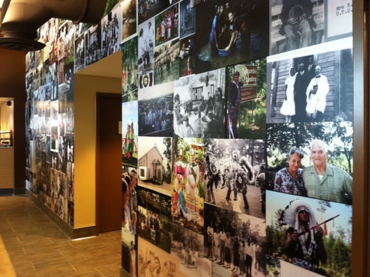 Mural of archival photographs give the inside of the store extra character