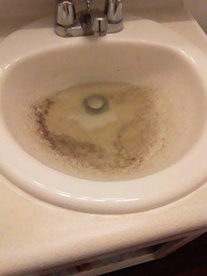 Upstairs nasty tenant putting grease and food in her drain. In turn, overflowed into my bathroom sink and cabinet. Ruined all my items.