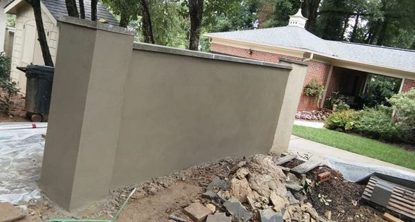 Divider wall cinder block base Covered what hardcoat stucco