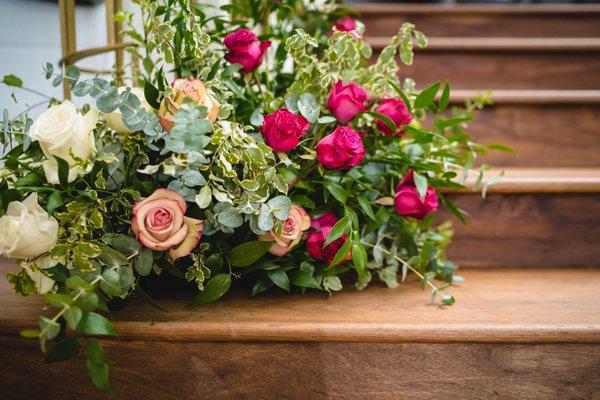 venue staircase florals