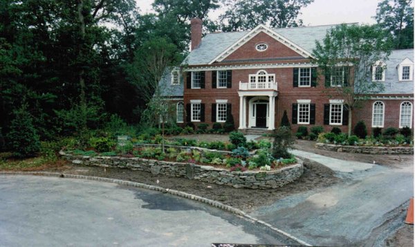 Retaining wall and beds added