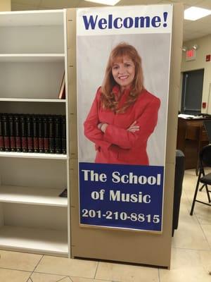 This is the director's picture at the entrance of the school