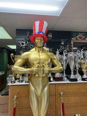 Take a photo with our Gold Man  He is celebrating Veterans Day. Wait for his Christmas Decorations.