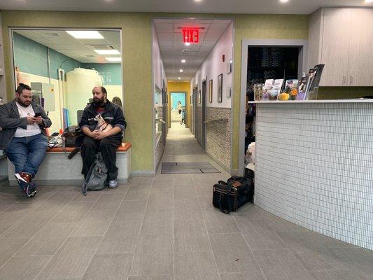 Lobby.  My boys are next to the desk in their carriers. They don't like vet visits and have vocally told me so....repeated