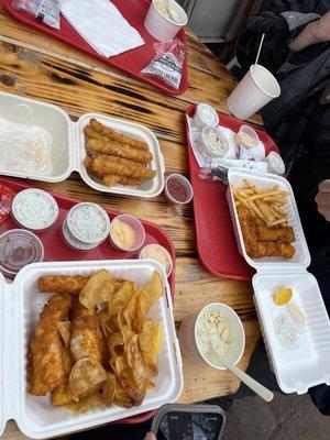 2 orders of the large fish and chips with house made potato chips and fries, clam chowder, calamari