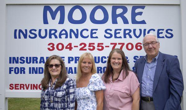 The staff of Moore Insurance