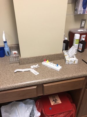 band aids from last patient still on counter