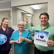 Powering up our dental care game! Excited dental team exploring the amazing benefits of Waterpik!