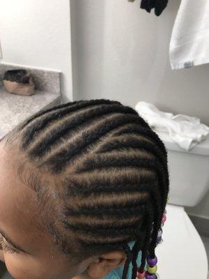 Hair braided with beads