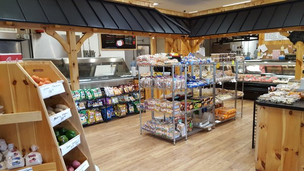 Full deli counter and butcher shop (meat counter). Lots of snack food, locally-grown produce. Hot food bar.