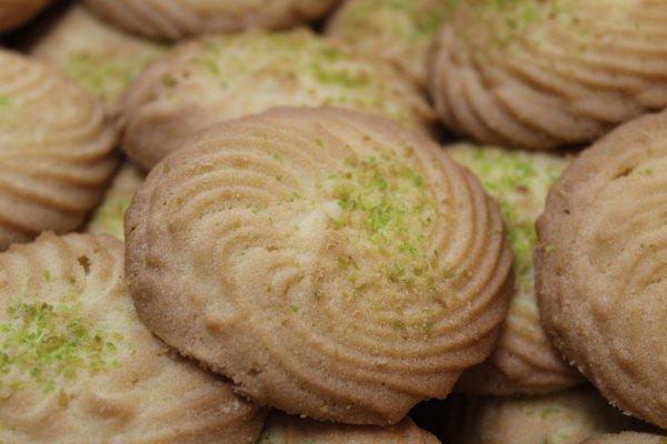 Hand-piped cookies sprinkled with pistachio