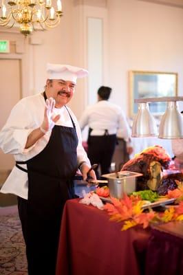 Chef ready to carve roast beef for you at Thanksgiving