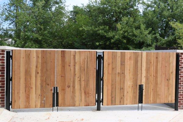 Wood dumpster gates.