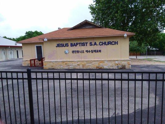 Front view of their old house of worship