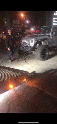 Jeep being hooked up