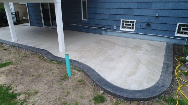 Concrete patio with border stained. Perfect for entertaining!