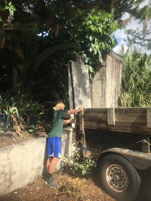 Hauling away or delivering dirt, rock, mulch