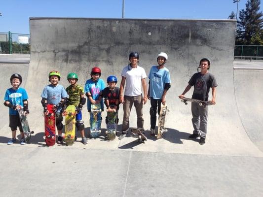 Happy skateboarding students